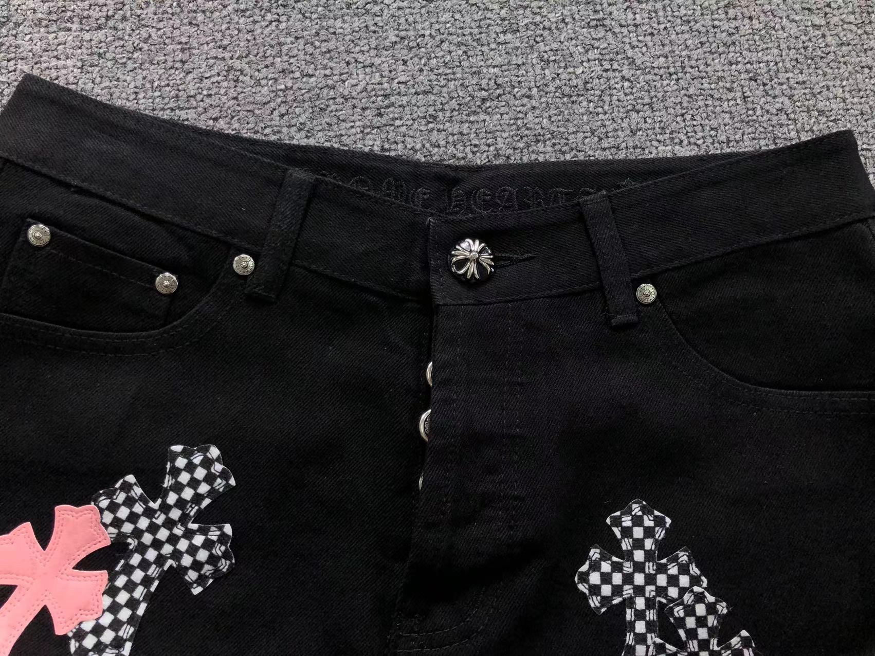 Checkered & Pink Cross Patch Black Jeans™