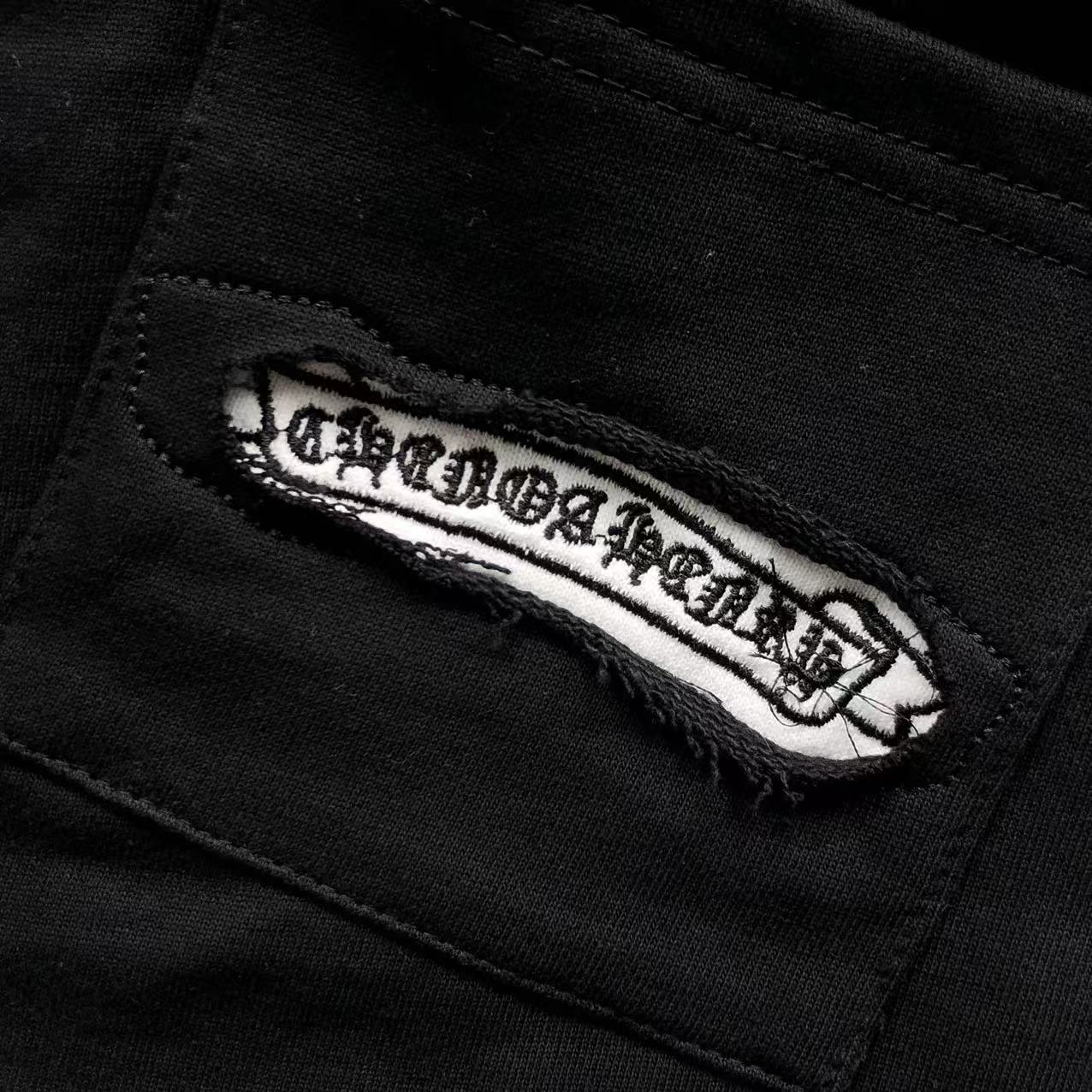 Torn Fabric Cross Black Sweatshorts™