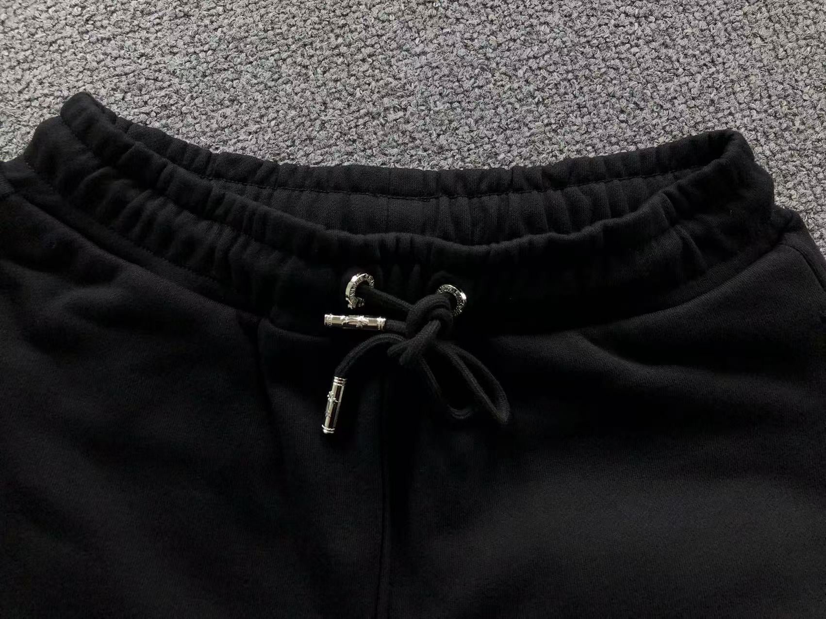 Black Cross Patch Black Sweatpants™