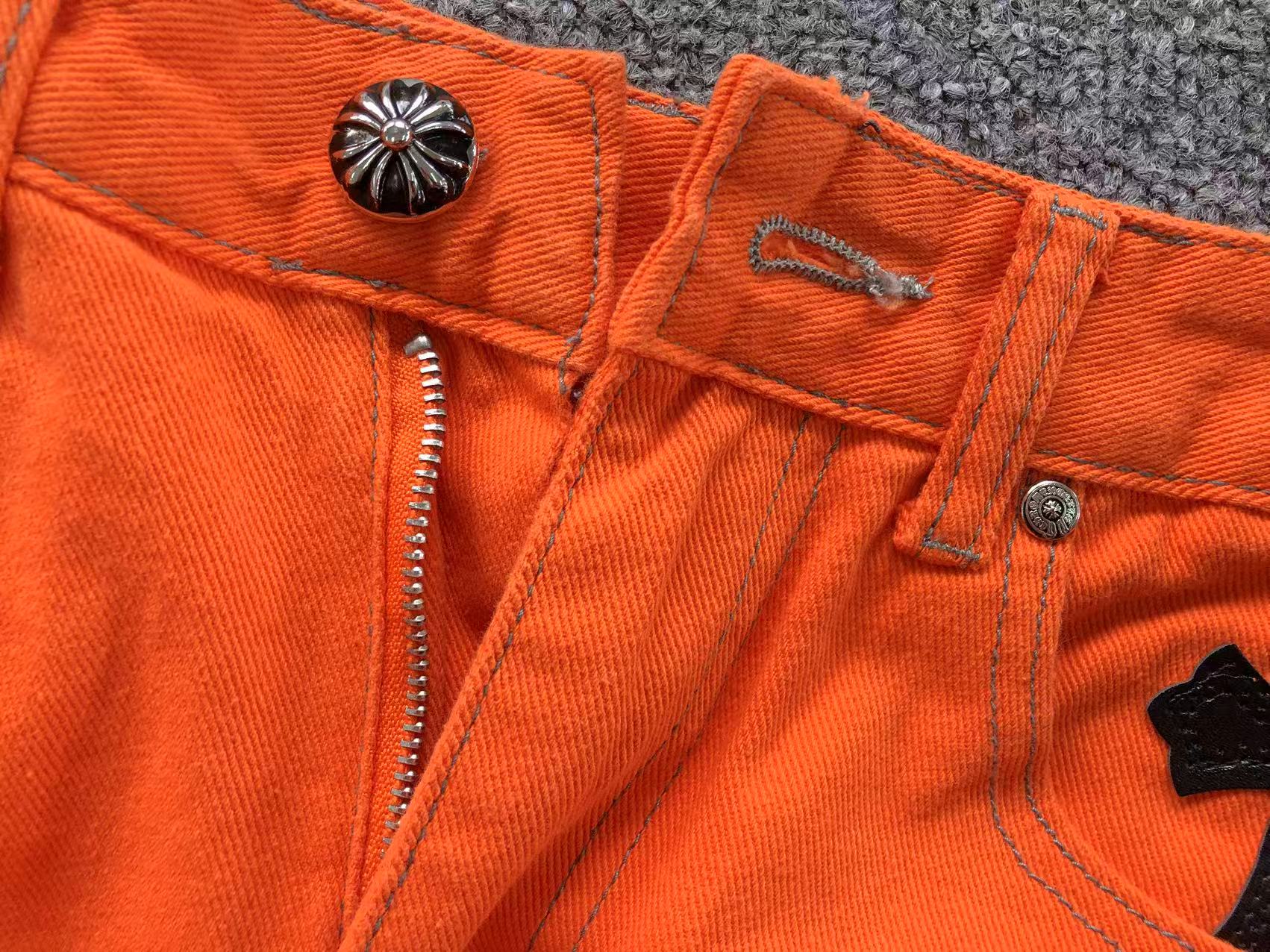 Black Cross Patch Orange Denim Jeans™