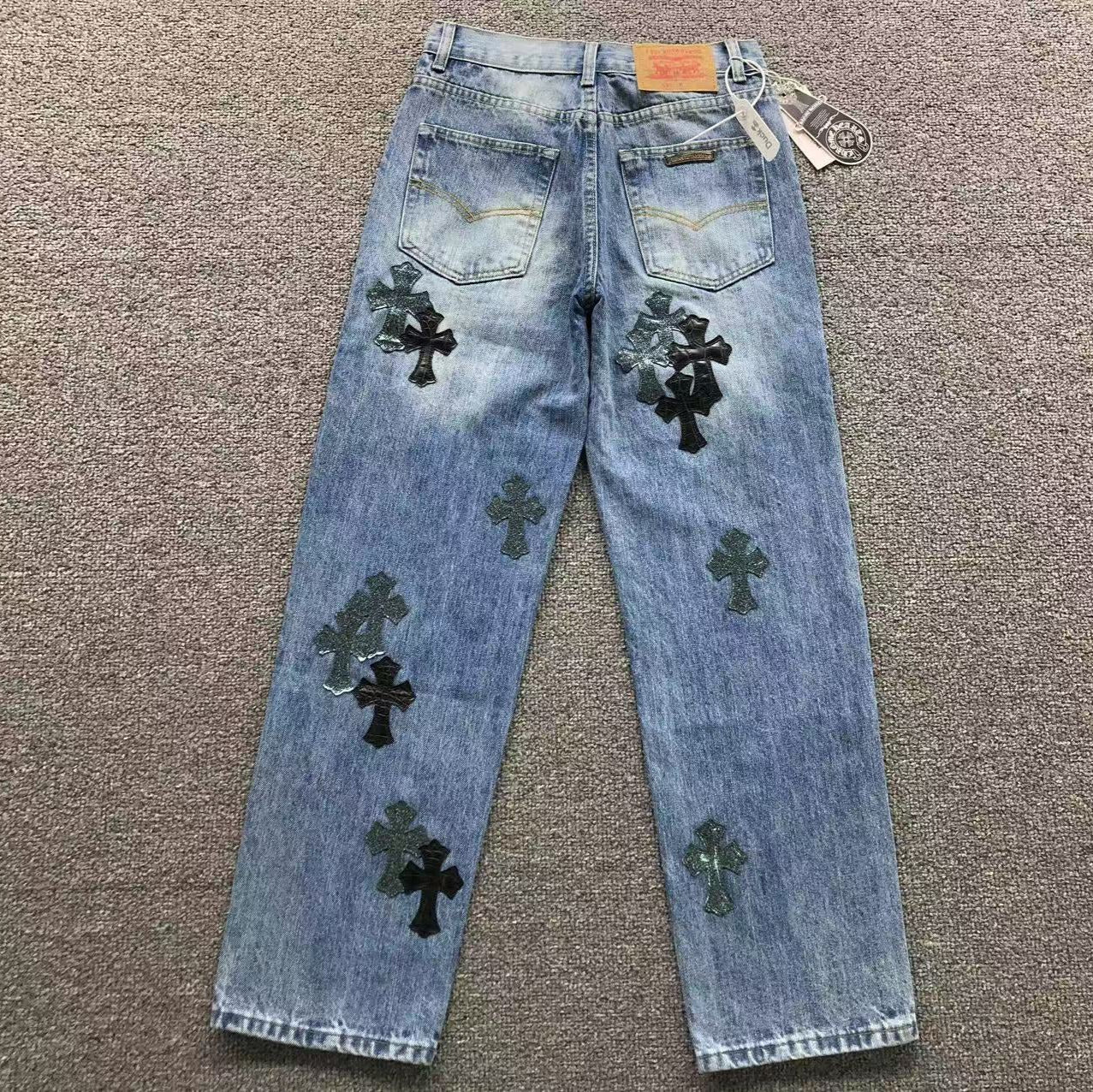 Black Leather Cross Patch Denim Jeans™