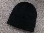 Flower Cross Beanie™