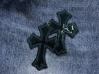 Black Cross Patch Distressed Denim Jeans™