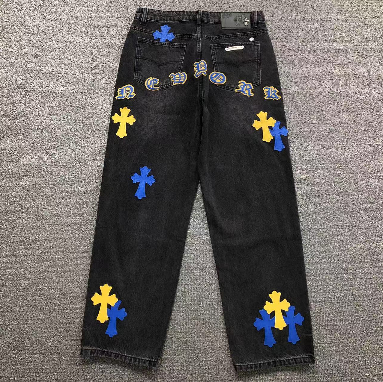 Blue & Yellow Cross Patch Black Jeans™