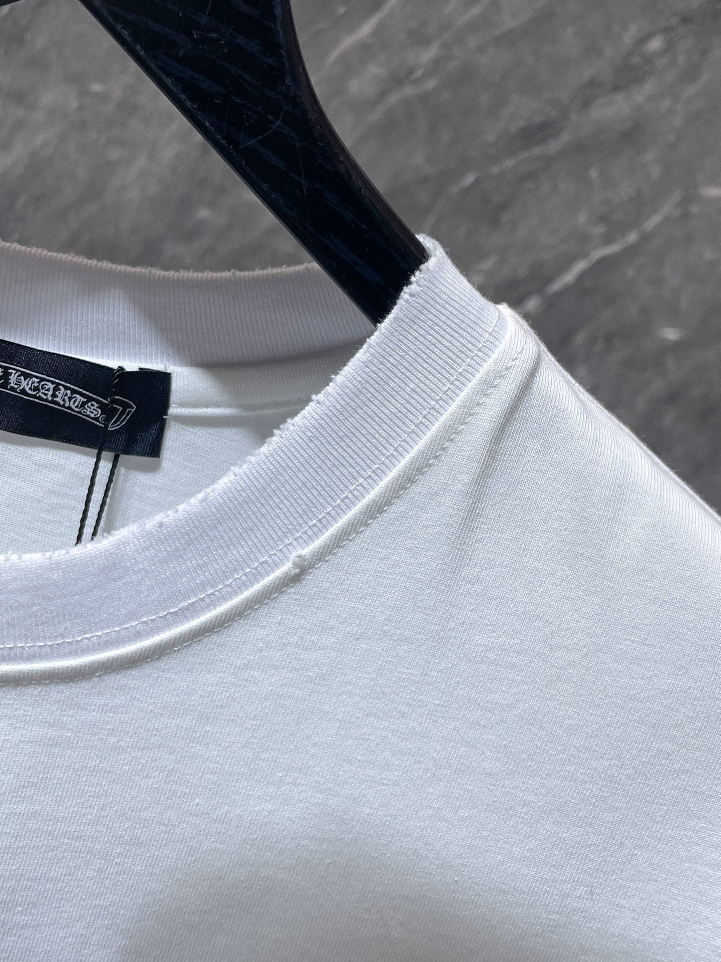White Embroidered Horseshoe Cross T-Shirt™