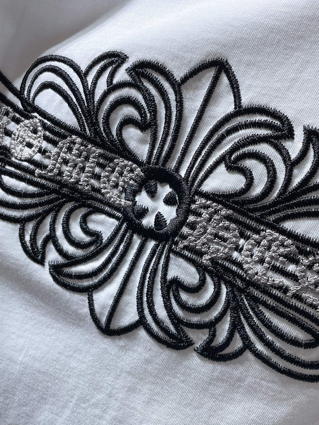 Fleur Cross Graphic White T-Shirt™