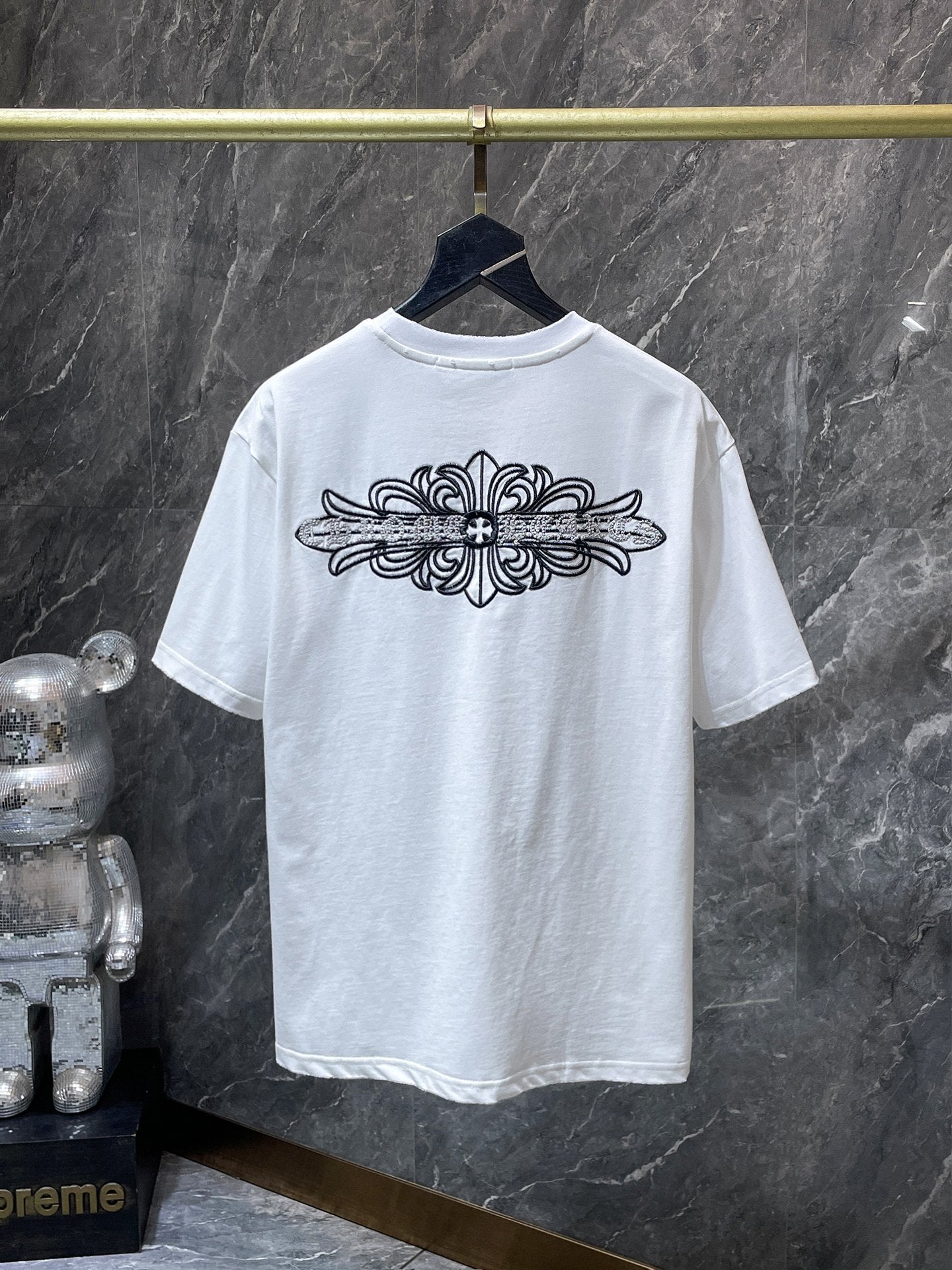 Fleur Cross Graphic White T-Shirt™