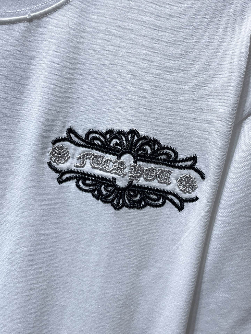 Fleur Cross Graphic White T-Shirt™