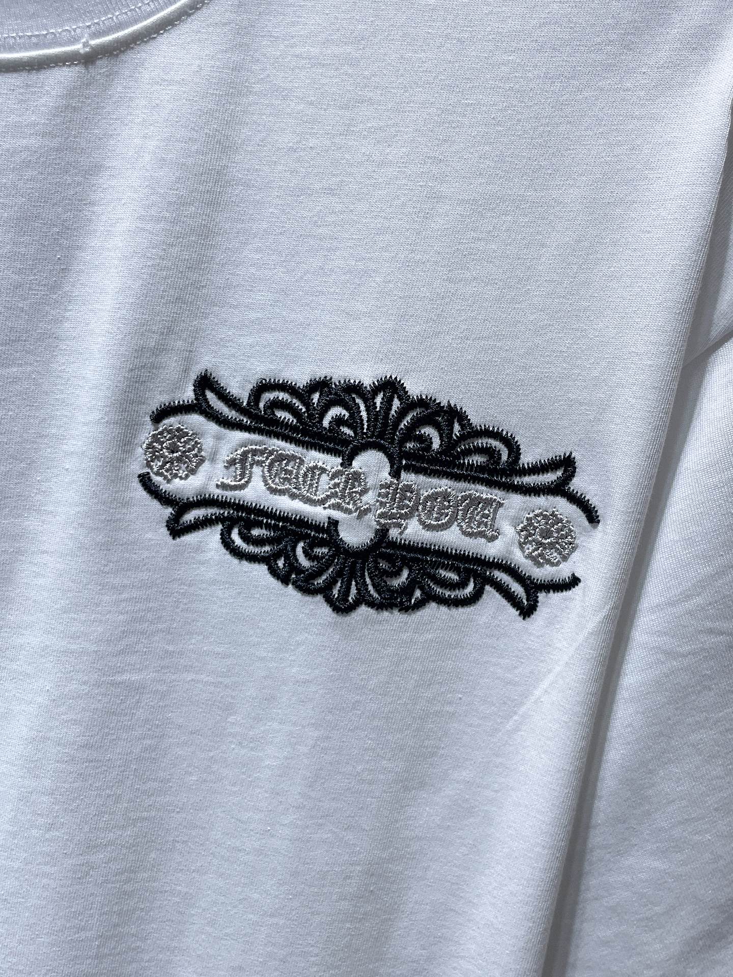 Fleur Cross Graphic White T-Shirt™