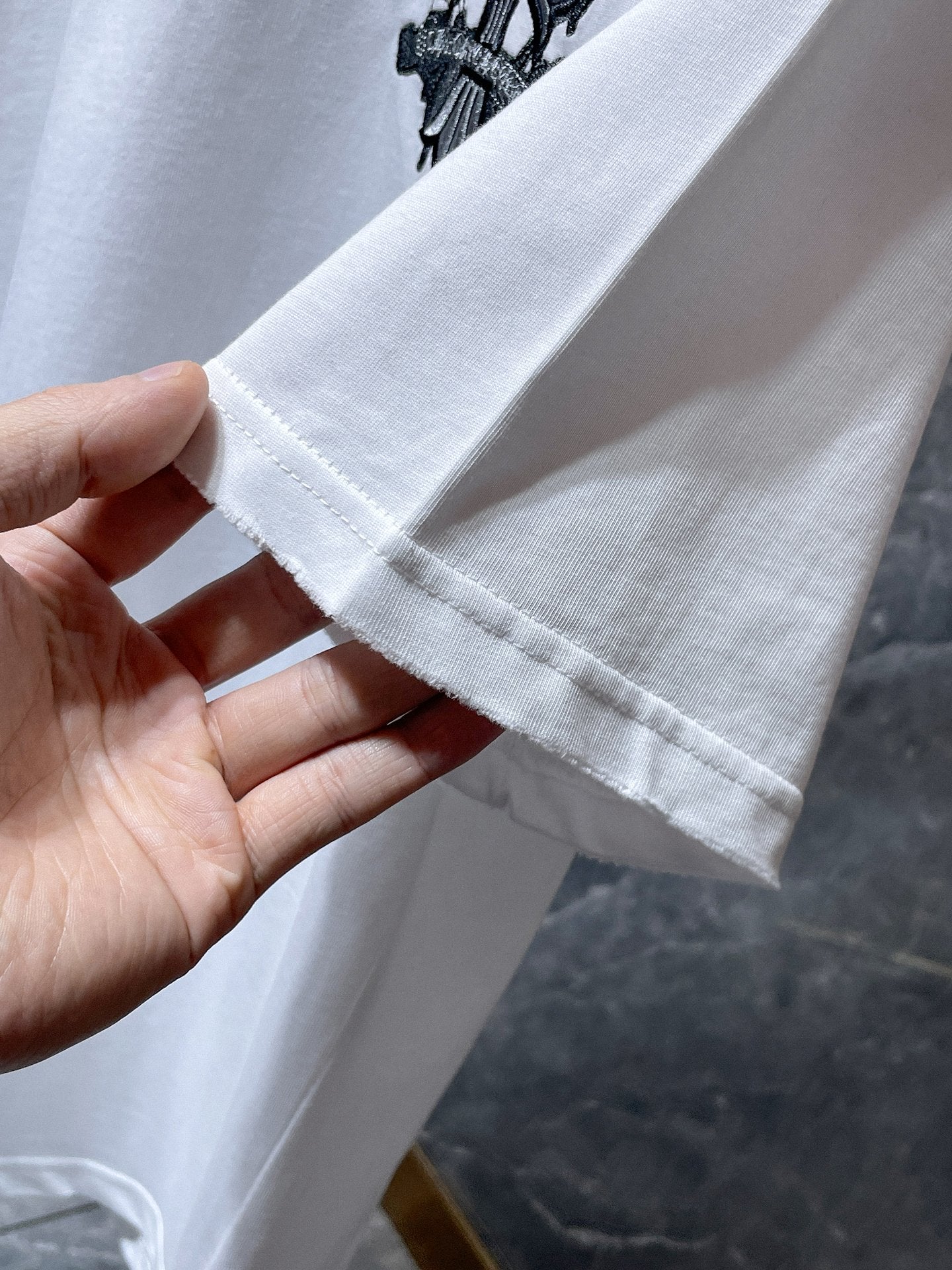 Embroidered Cross Crest White T-Shirt™
