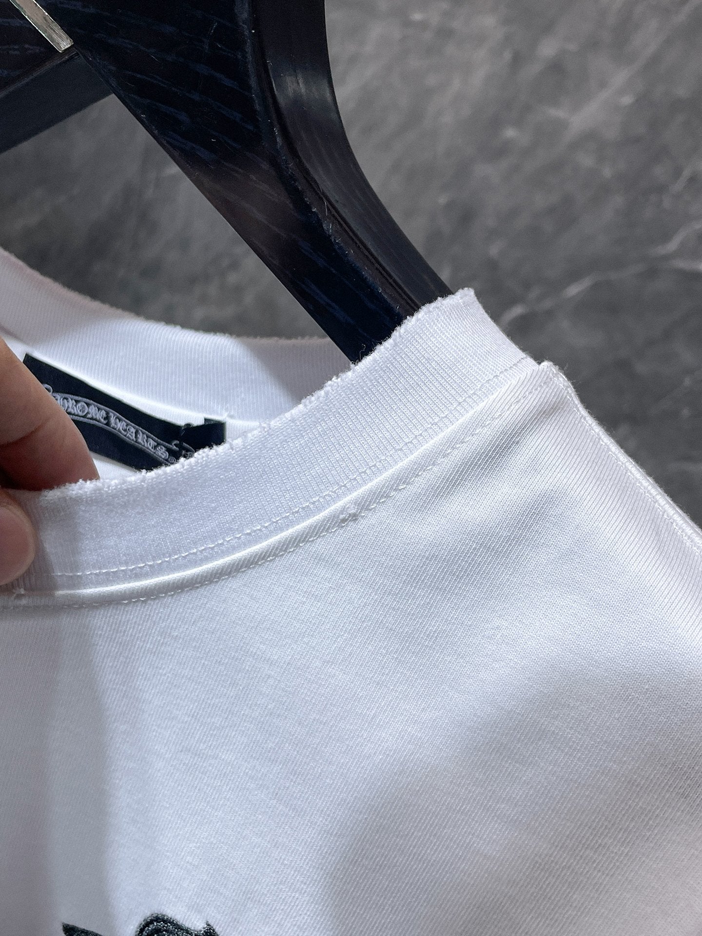 Embroidered Cross Crest White T-Shirt™