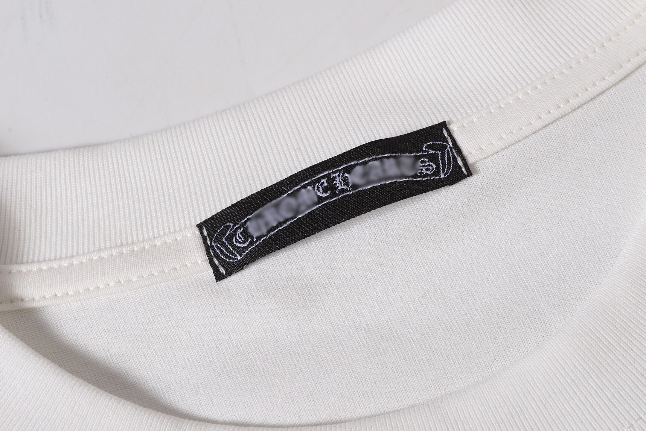 Faded Horseshoe Logo White T-Shirt™