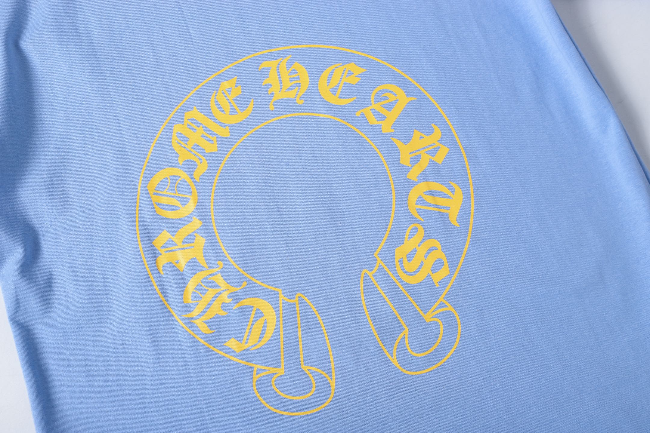 Yellow Horseshoe Light Blue T-Shirt™