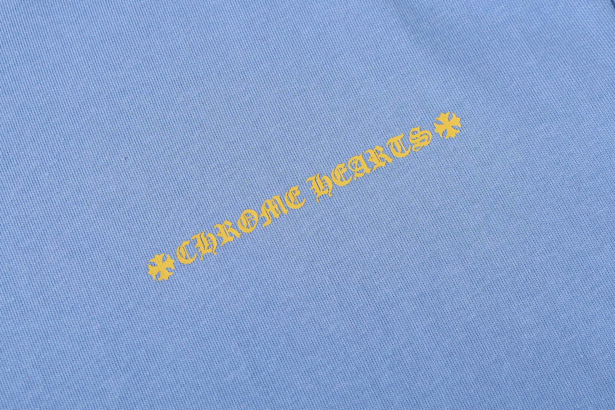 Yellow Horseshoe Light Blue T-Shirt™