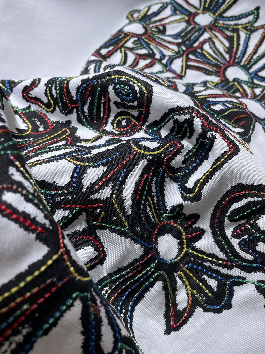 Multicolor Cross Cluster White T-Shirt™