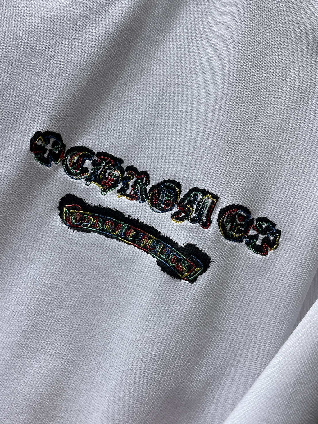 Multicolor Cross Cluster White T-Shirt™