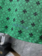 Monogram Floral Cross Green T-Shirt™